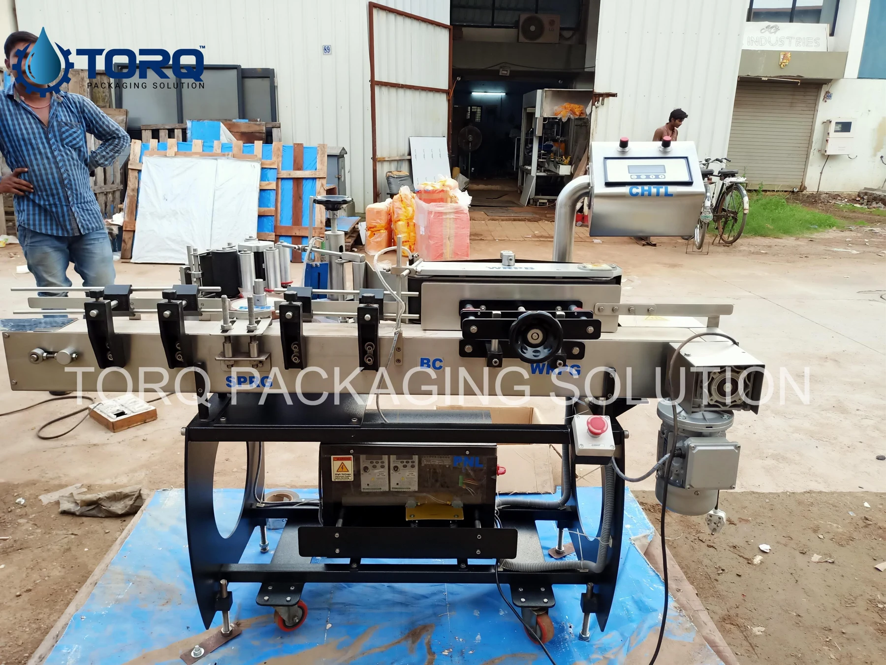 Bottle labelling machine — workshop view