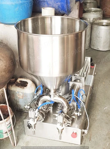 Double-nozzle paste filling machine