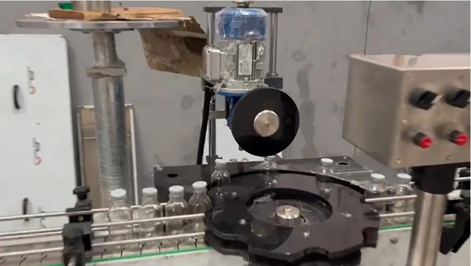 Rubber stopper insertion machine