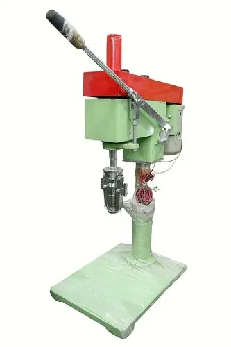 Tin cap sealing machine